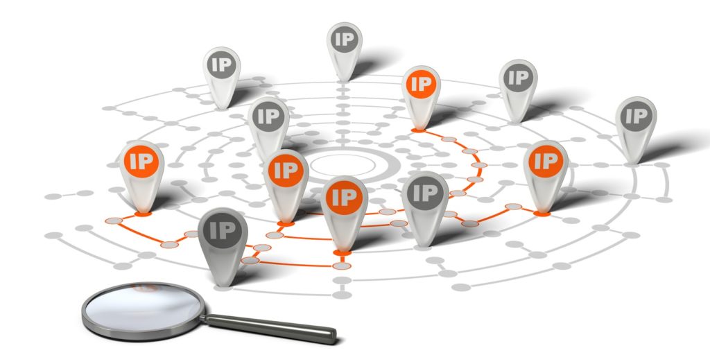 Illustration of many flags with the word IP pinned on the network over a white background and a magnifier.
