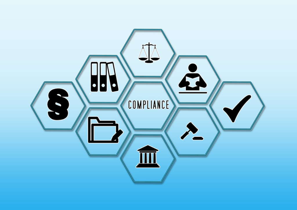 Illustration showing a group of business related icons surrounding the word compliance.