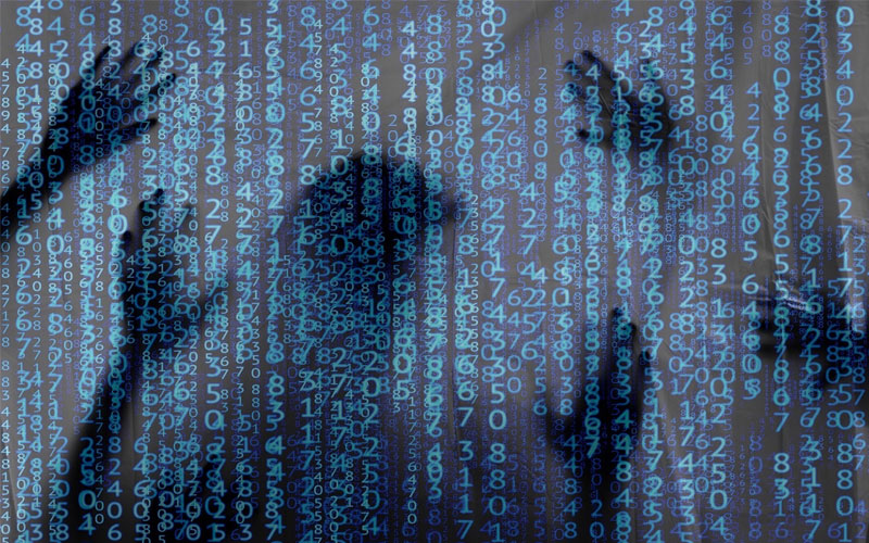 Image of dark silhouettes trapped behind a wall of digital numbers.