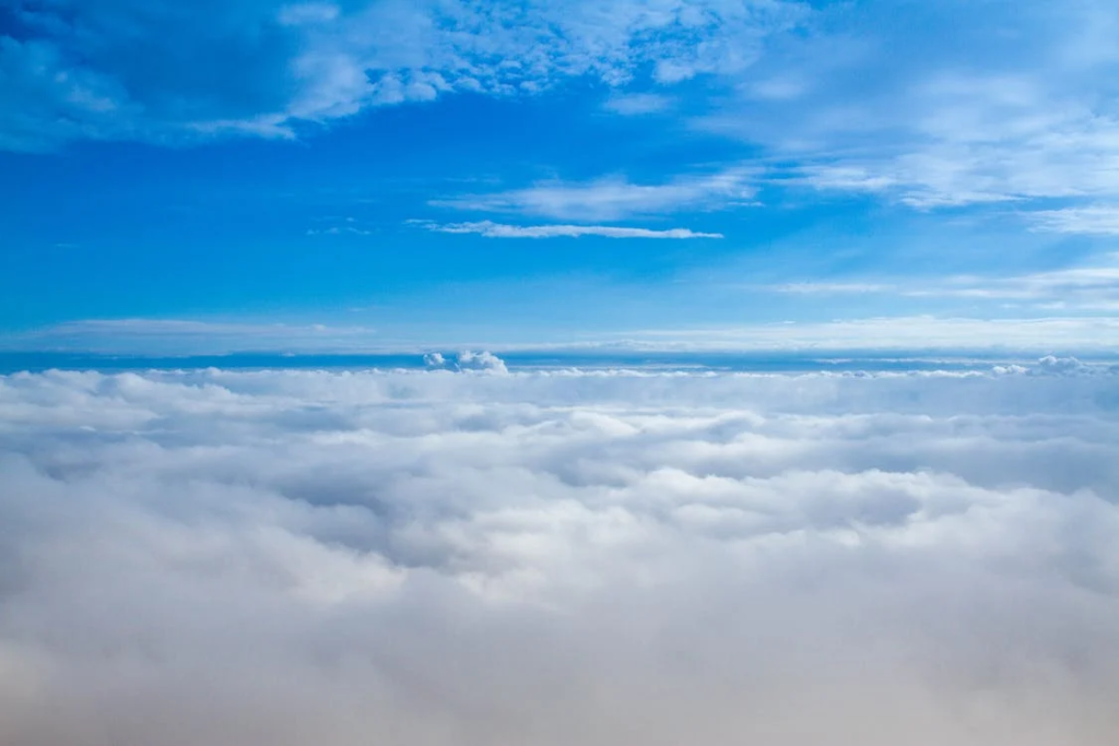 Image of the sky taken from above the clouds.