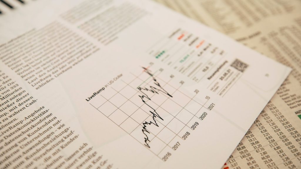 Image of a paper with a chart drawn on it to signify the economy.