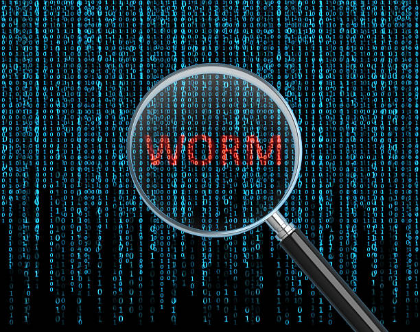 Infographic of the word worm surrounded by code in a magnifying glass.