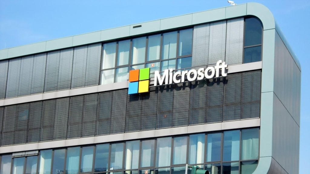 Photo of a building with the Microsoft logo on the facade in Cologne, Germany.