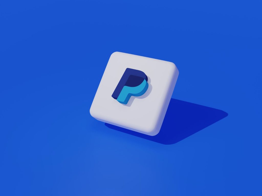 The image shows a PayPal logo against a blue background.